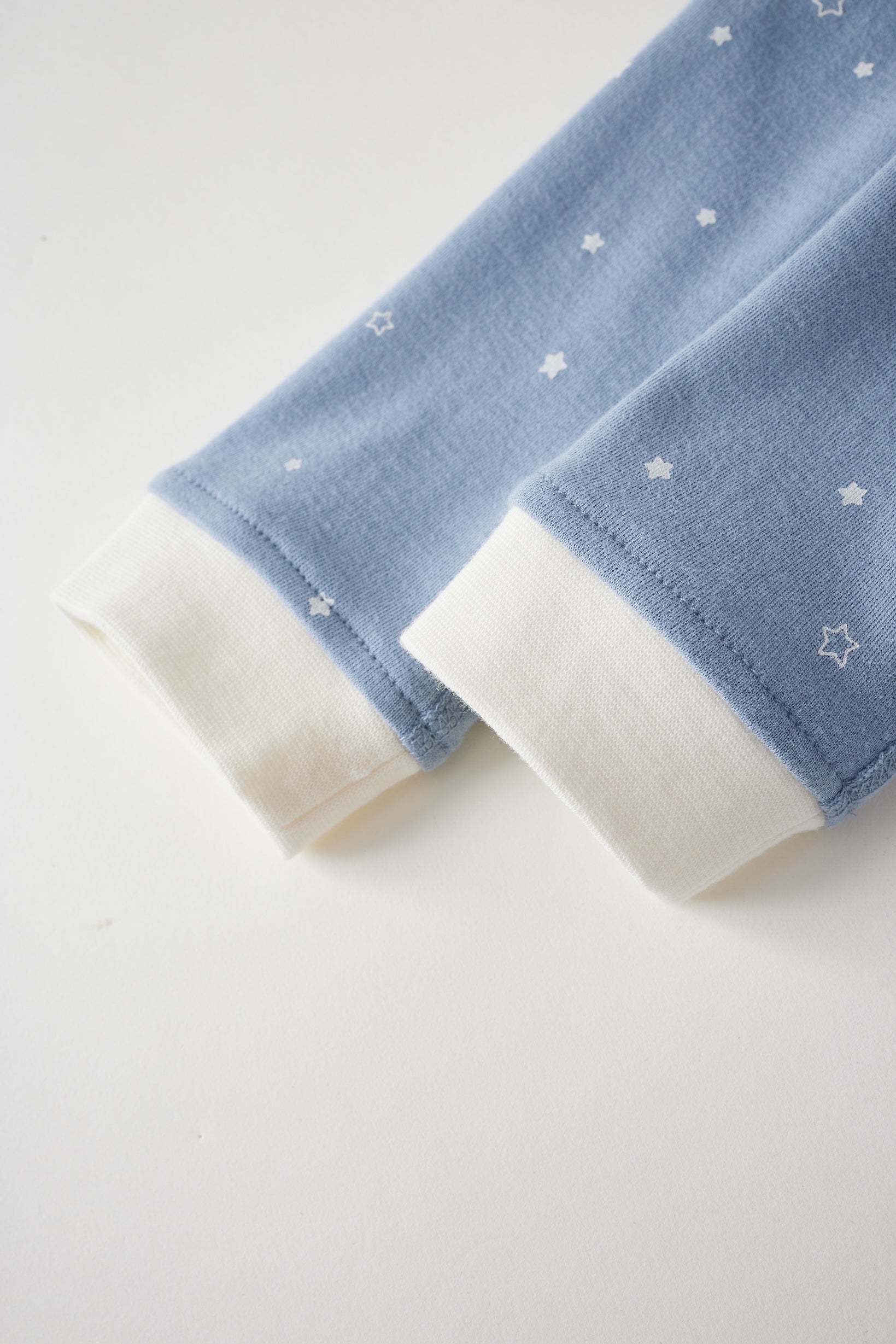 sleeve with white stars on a light gray background