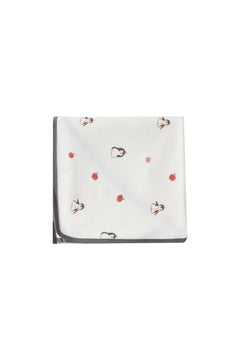 White swaddle blanket with red and black patterns on a white background