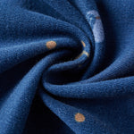 Close-up of blue fabric with hockey patterns