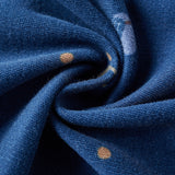 Close-up of blue fabric with hockey patterns