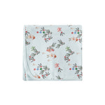 Floral patterned blanket on a white background