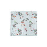 Floral patterned blanket on a white background