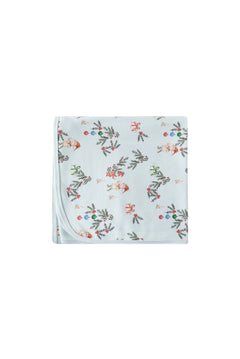 Floral patterned blanket on a white background