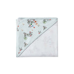  blanket with floral embroidery on a white background