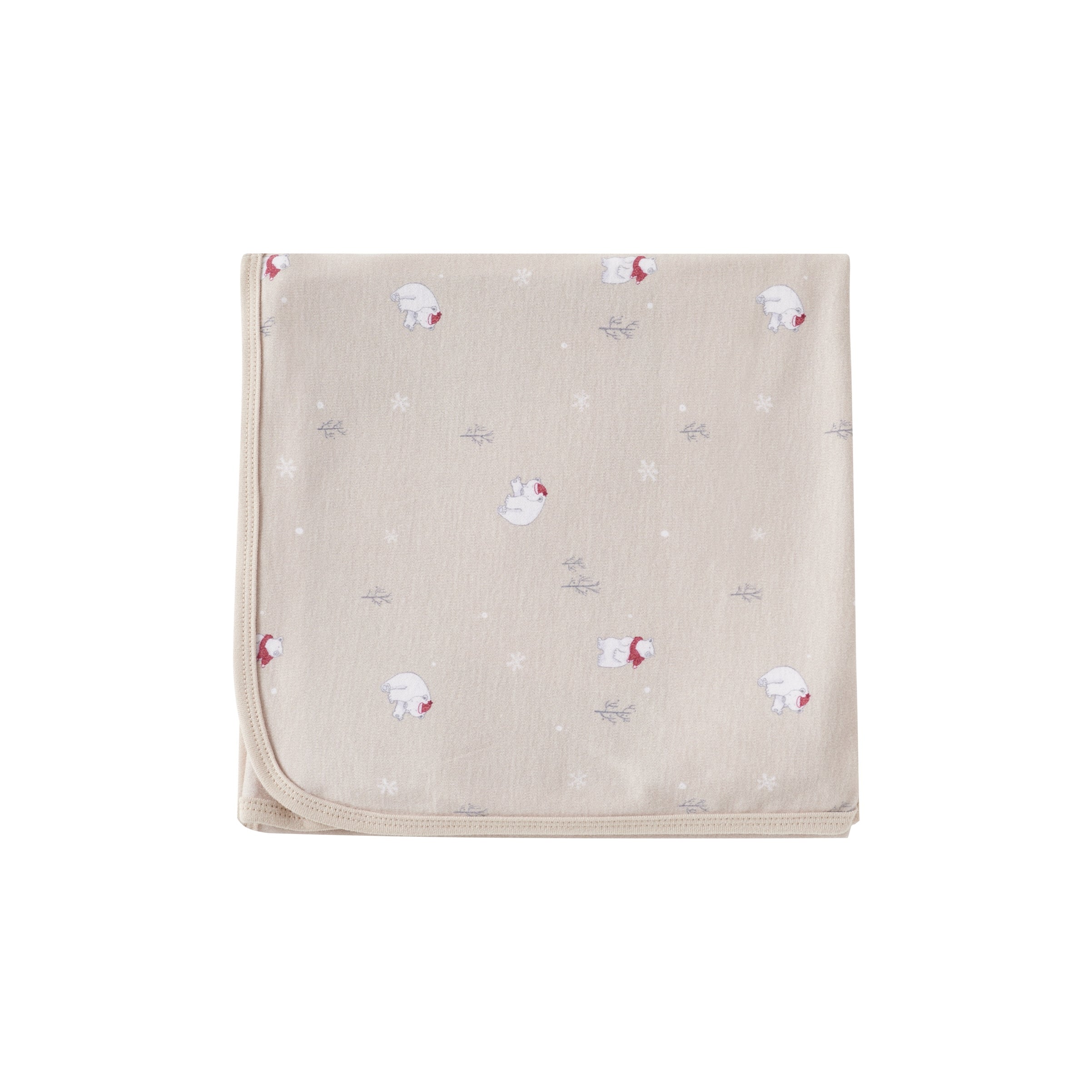 Beige blanket with red and white floral patterns on a white background