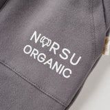 Gray fabric with 'NORSU ORGANIC' logo on a white background