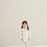 baby standing wearing Organic Toddler Pajama Set-Blueberry