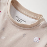 Beige baby outfit with bear illustrations and 'Norsu Organic' label on a white background