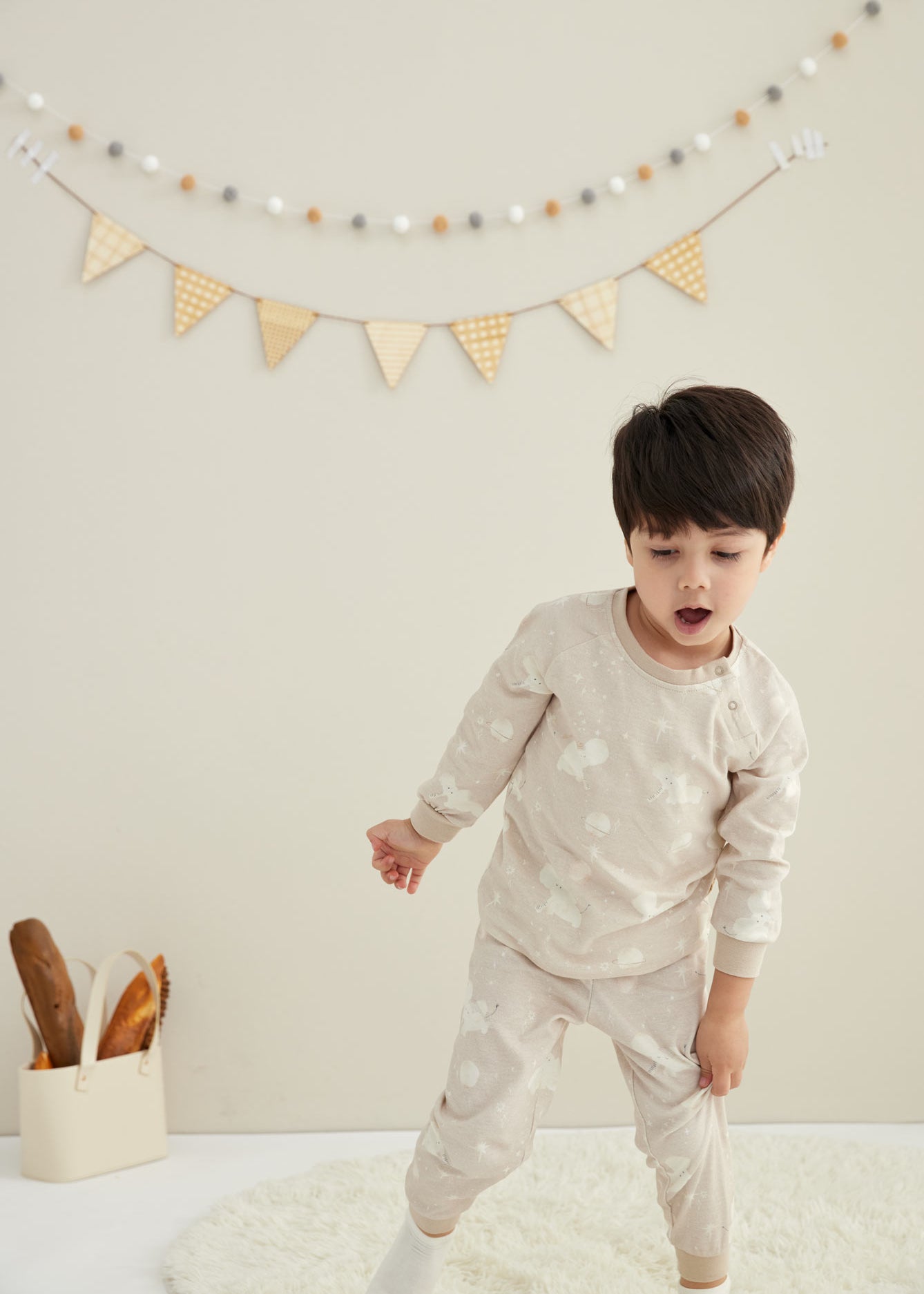 Model wearing Organic Toddler Pajama Set-Stary