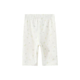 White baby pants with small patterns on a white background