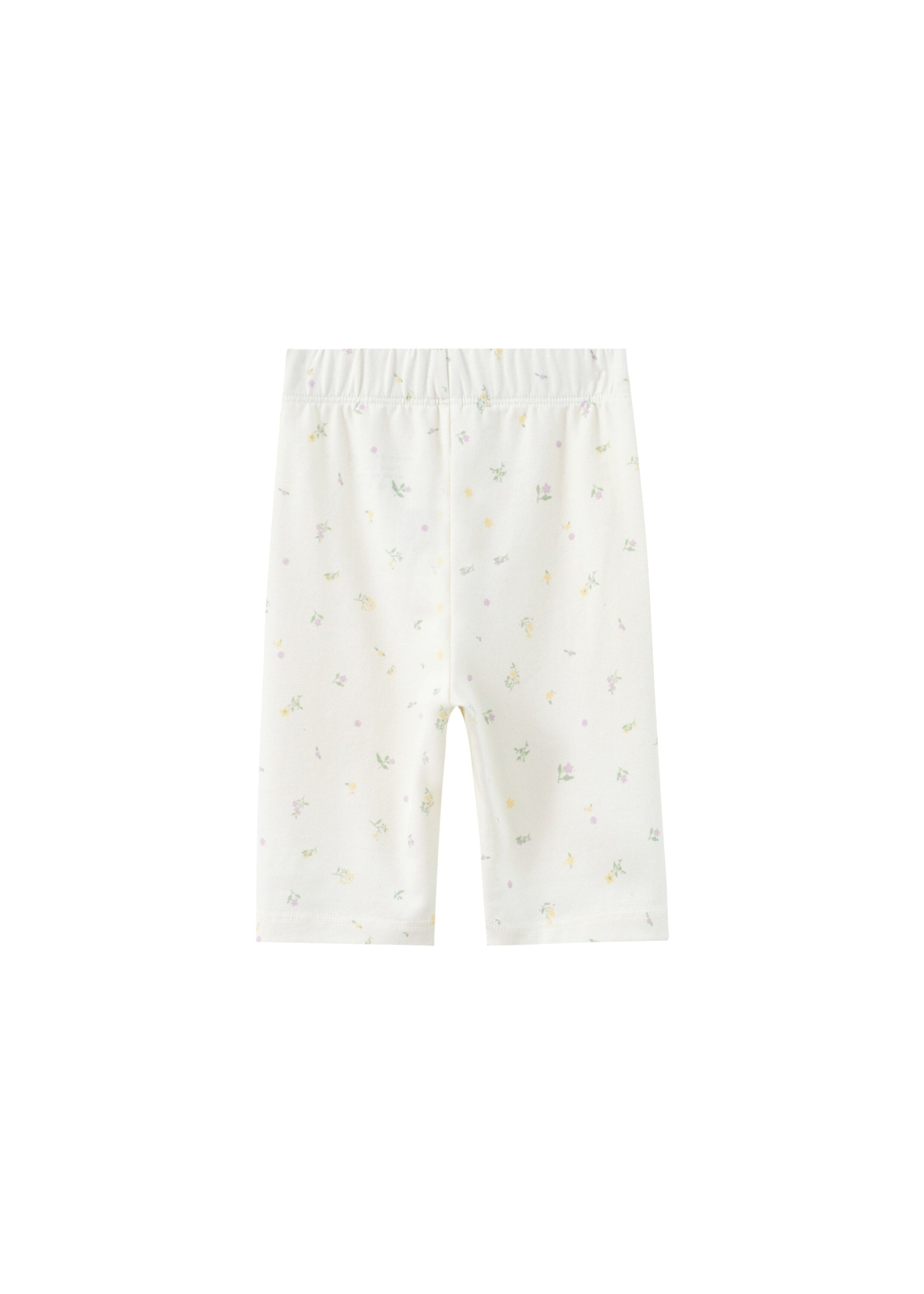 White baby pants with small patterns on a white background