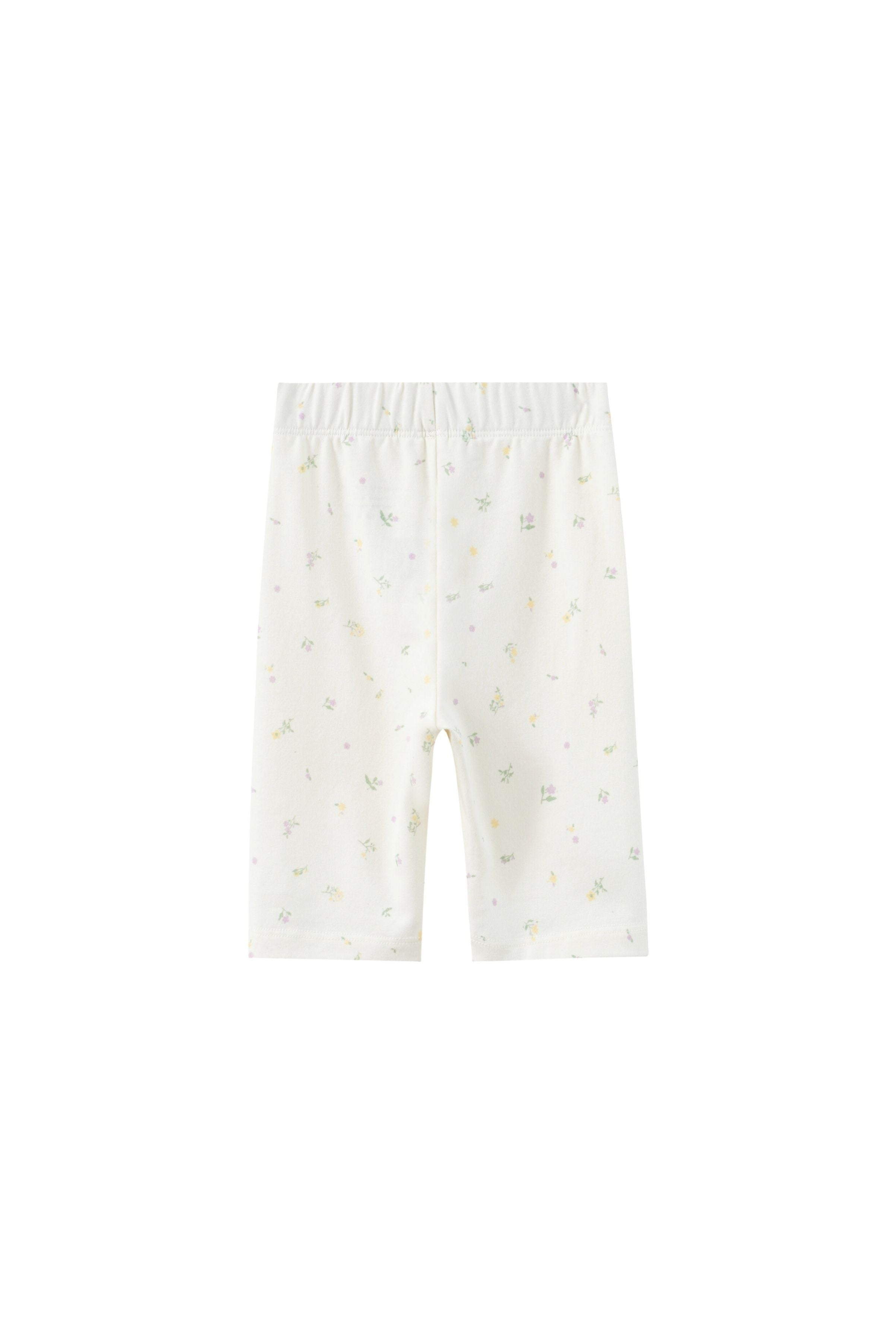 White baby pants with small patterns on a white background