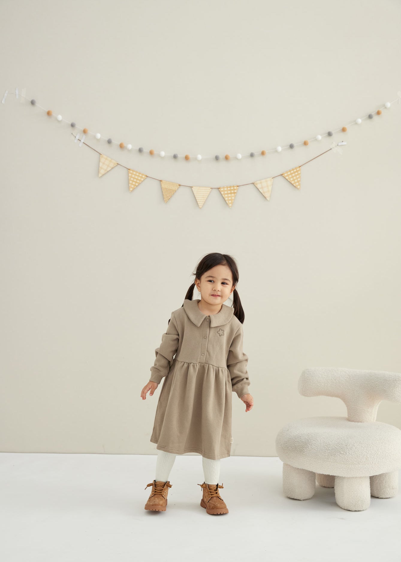 baby is smlling and watching her mommy