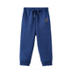 Blue sweatpants with a small logo on a white background