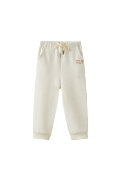 Beige sweatpants with a logo on a white background