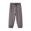 Gray sweatpants with small white patterns on a white background
