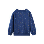 Blue sweater with small patterns on a white background