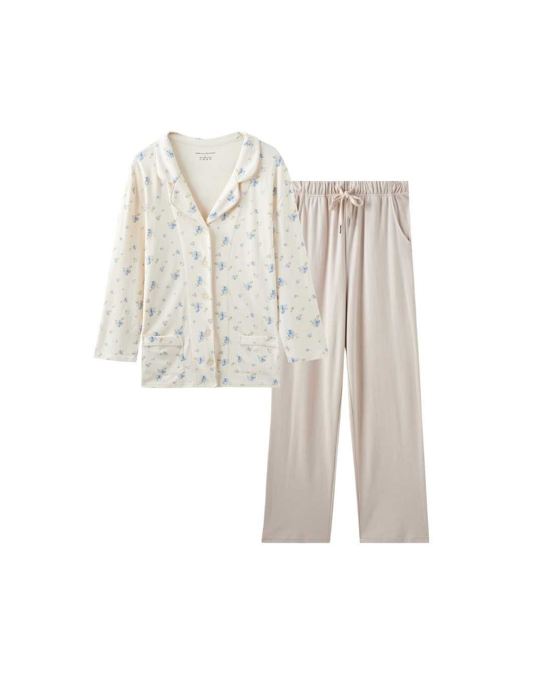 women pajama top and beige pants on a white background