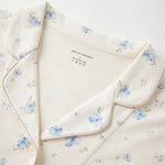 blueberry-patterned garment on a white background