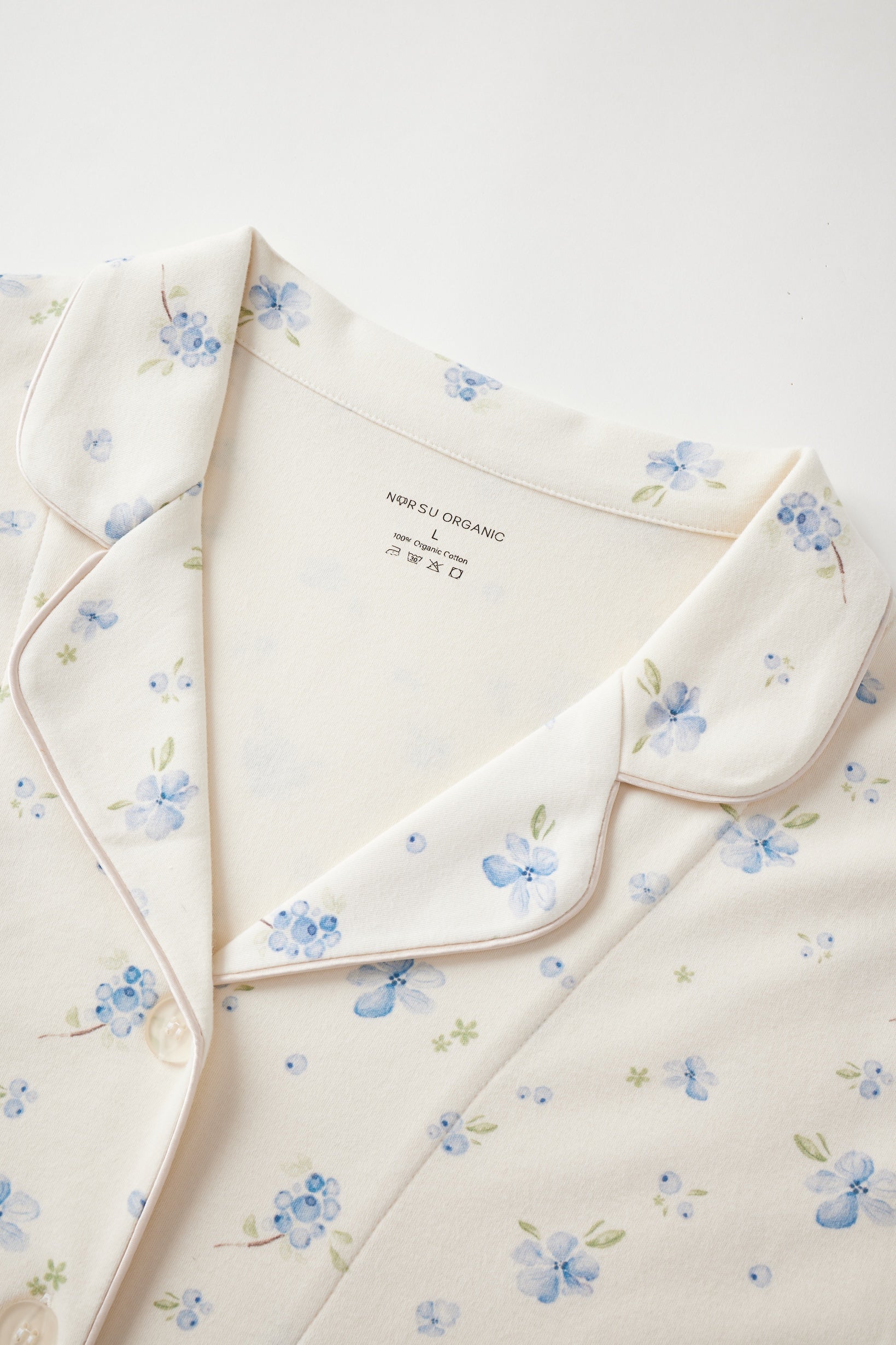 blueberry-patterned garment on a white background
