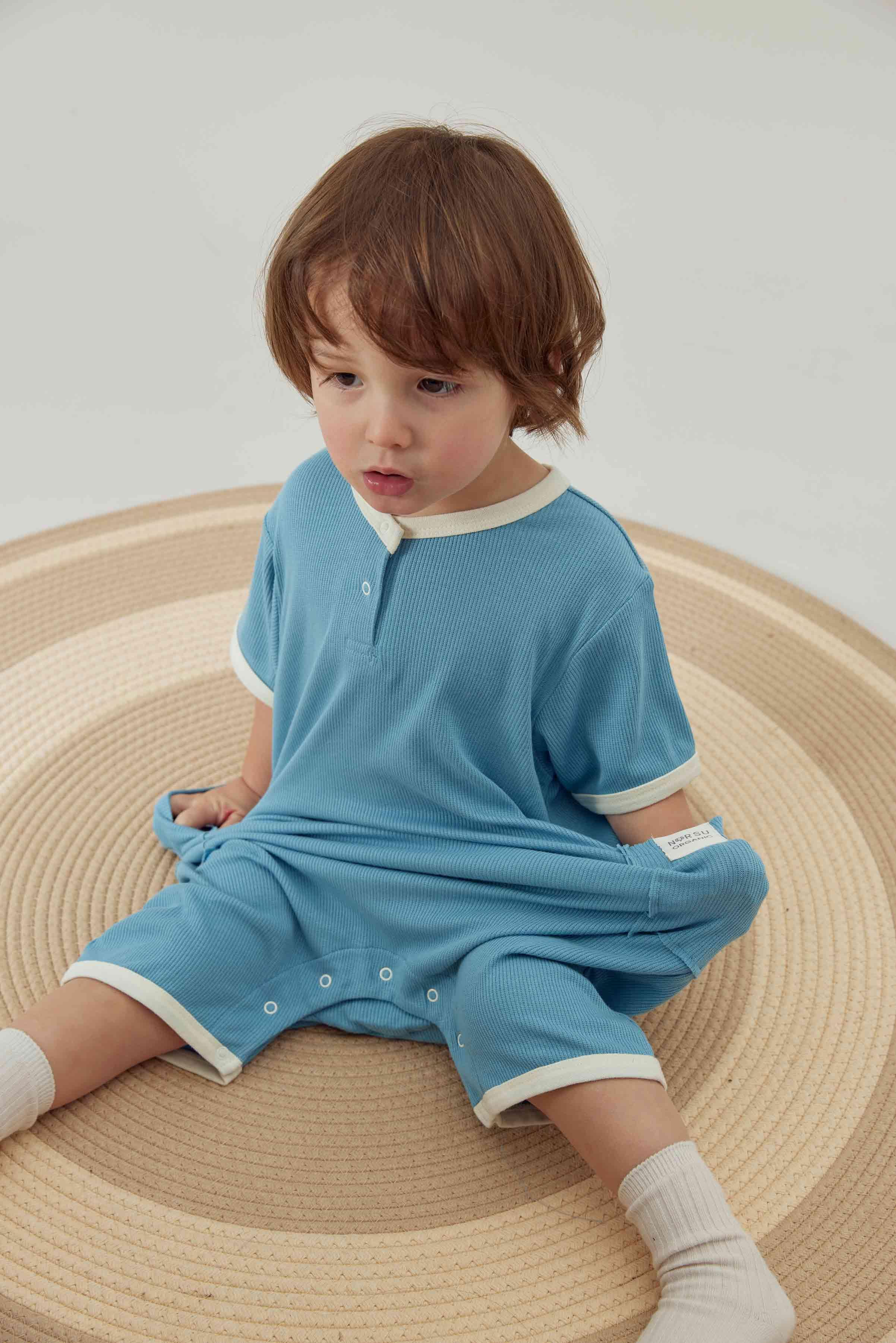 Model Wearing Baby Organic Bamboo Romper-Delphinium Blue